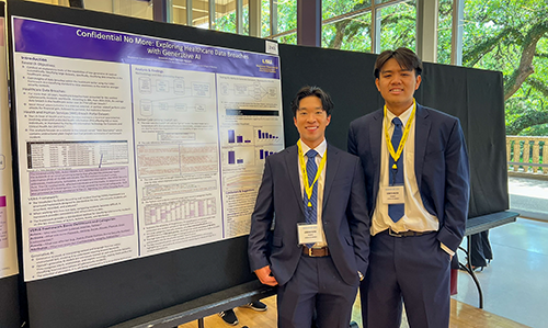 Jeremiah Huynh and Kenneth Nguyen stand in front of a research poster at LSU Discovery Day 2025