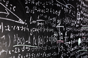 math formulas and scientific formulas on a chalkboard