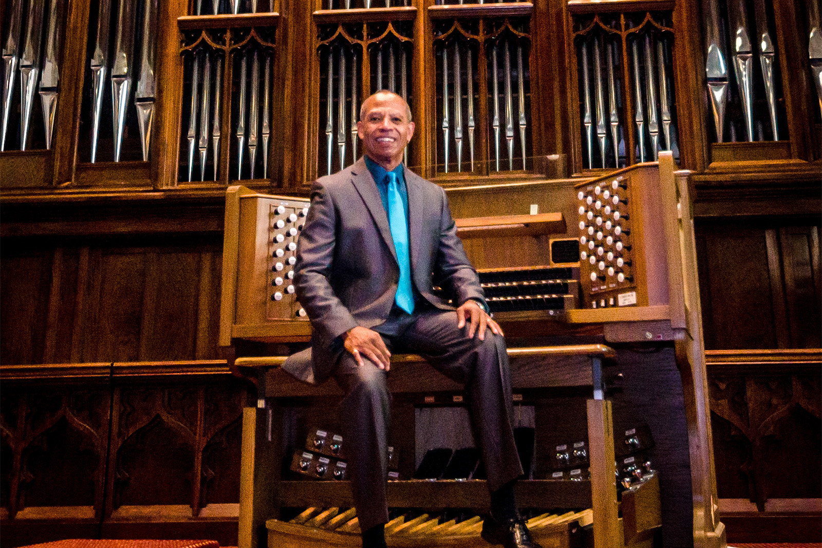 herndon spillman sitting at an organ