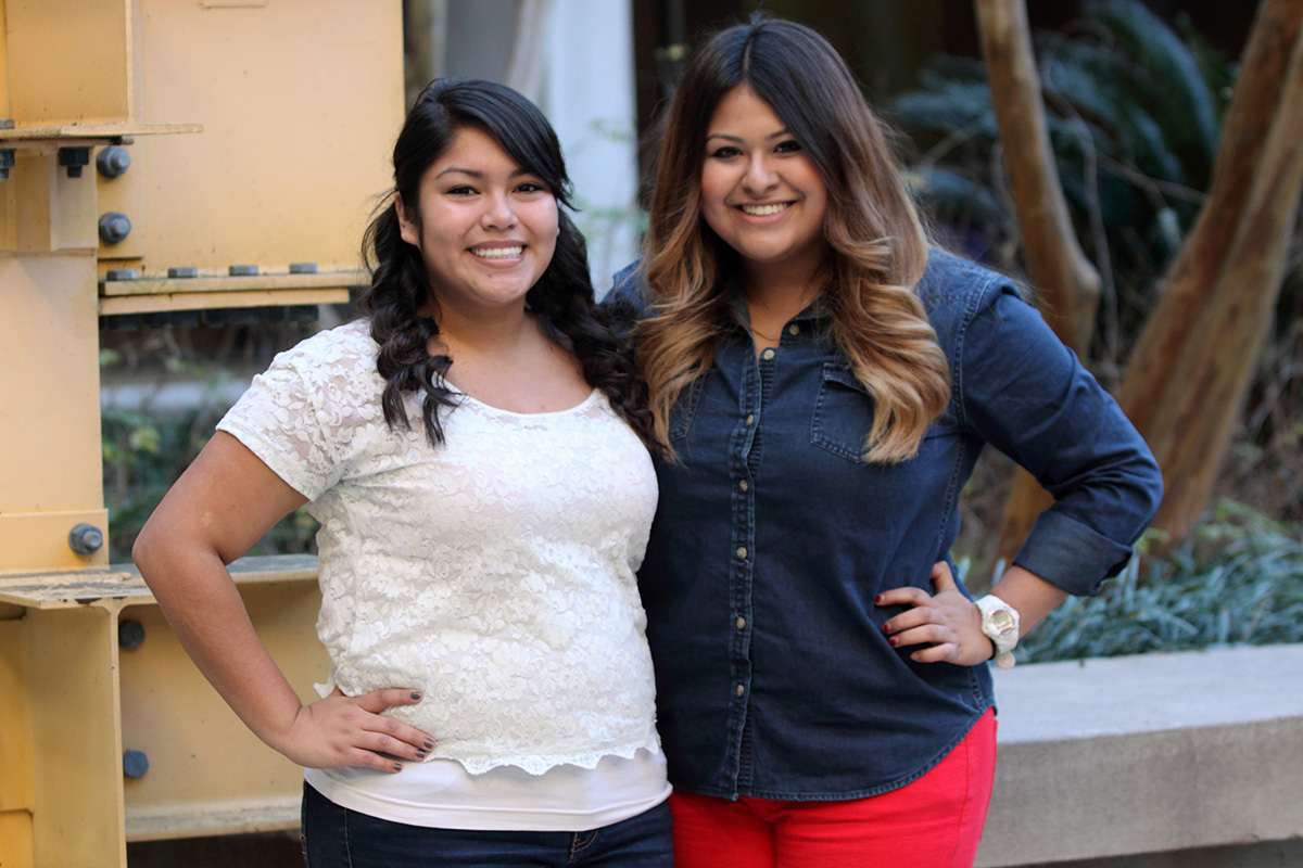 Two women posing for photo