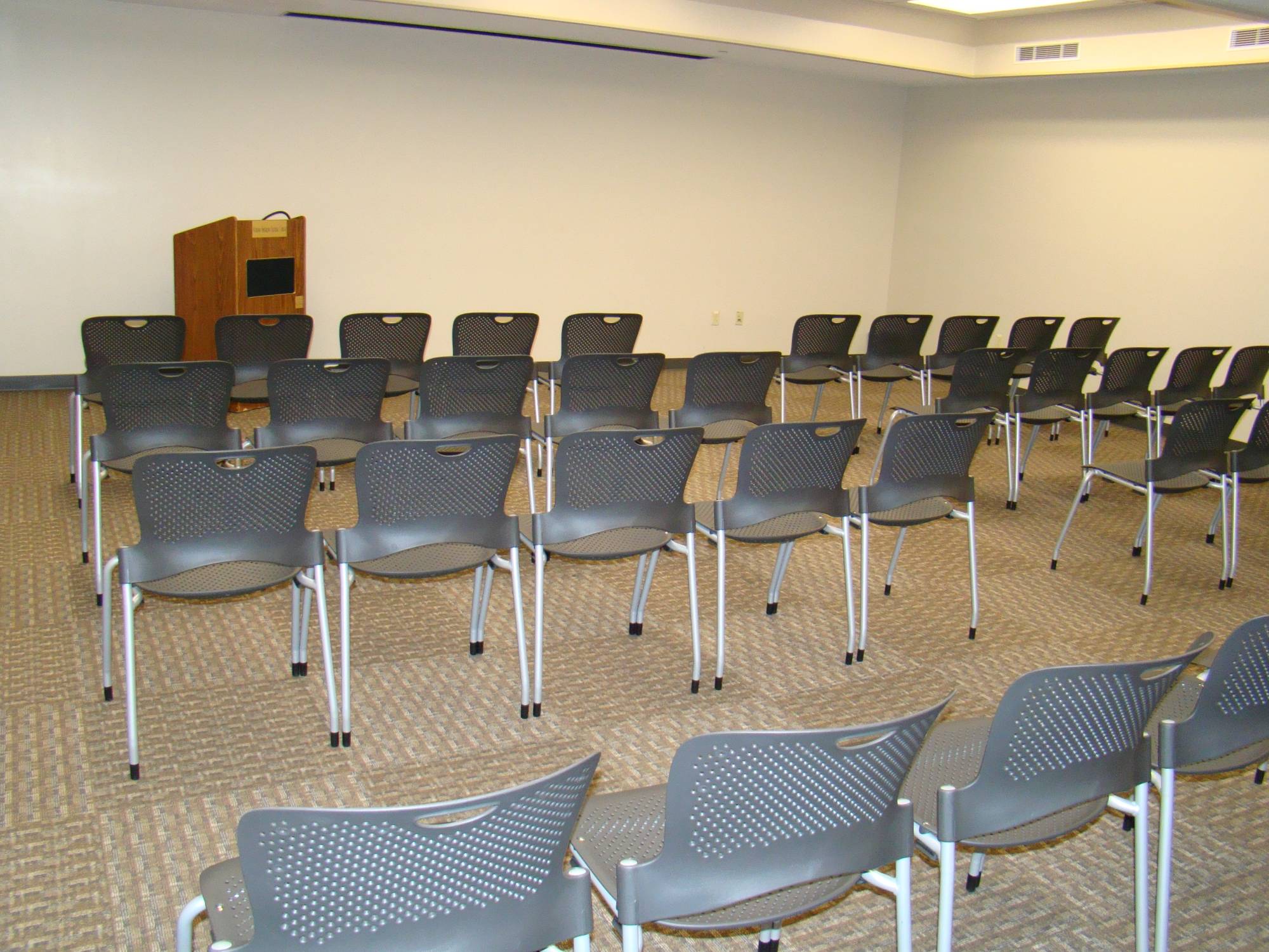 Multipurpose room configured for a speaker