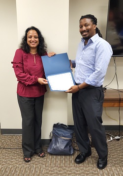 Awardee Erik Adams and Awards Chair Asiya Alam