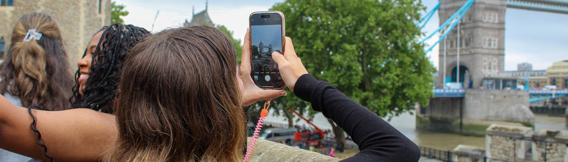student taking picture abroad student taking picture abroad